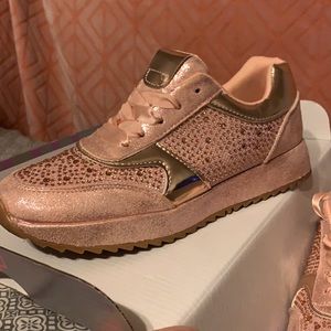 Pink sparkle/gemmed out sneakers with a silky lace for the shoe strings